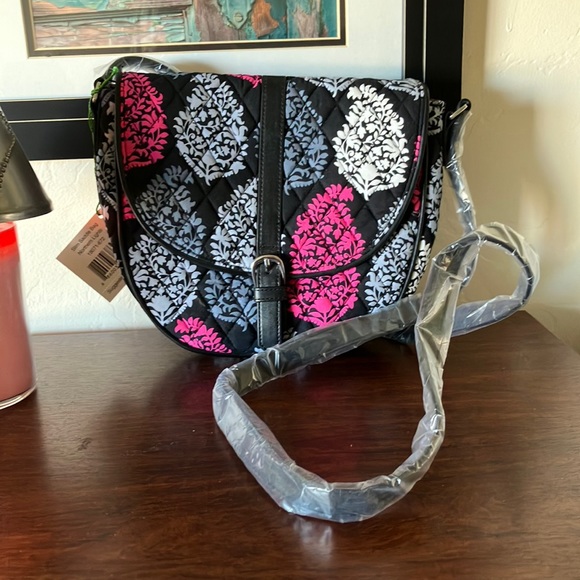 Vera Bradley Handbags - NWT Vera Bradley Slim Saddle cross Body Bag in northern lights pattern